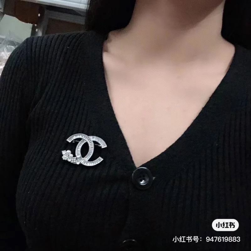 Ch**el brooches